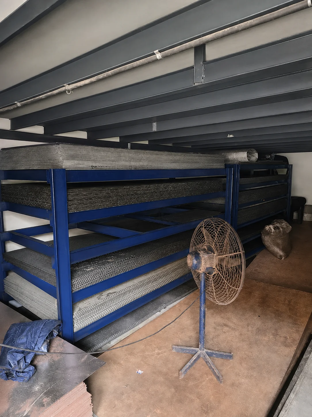Sheet stock organized in workshop racks