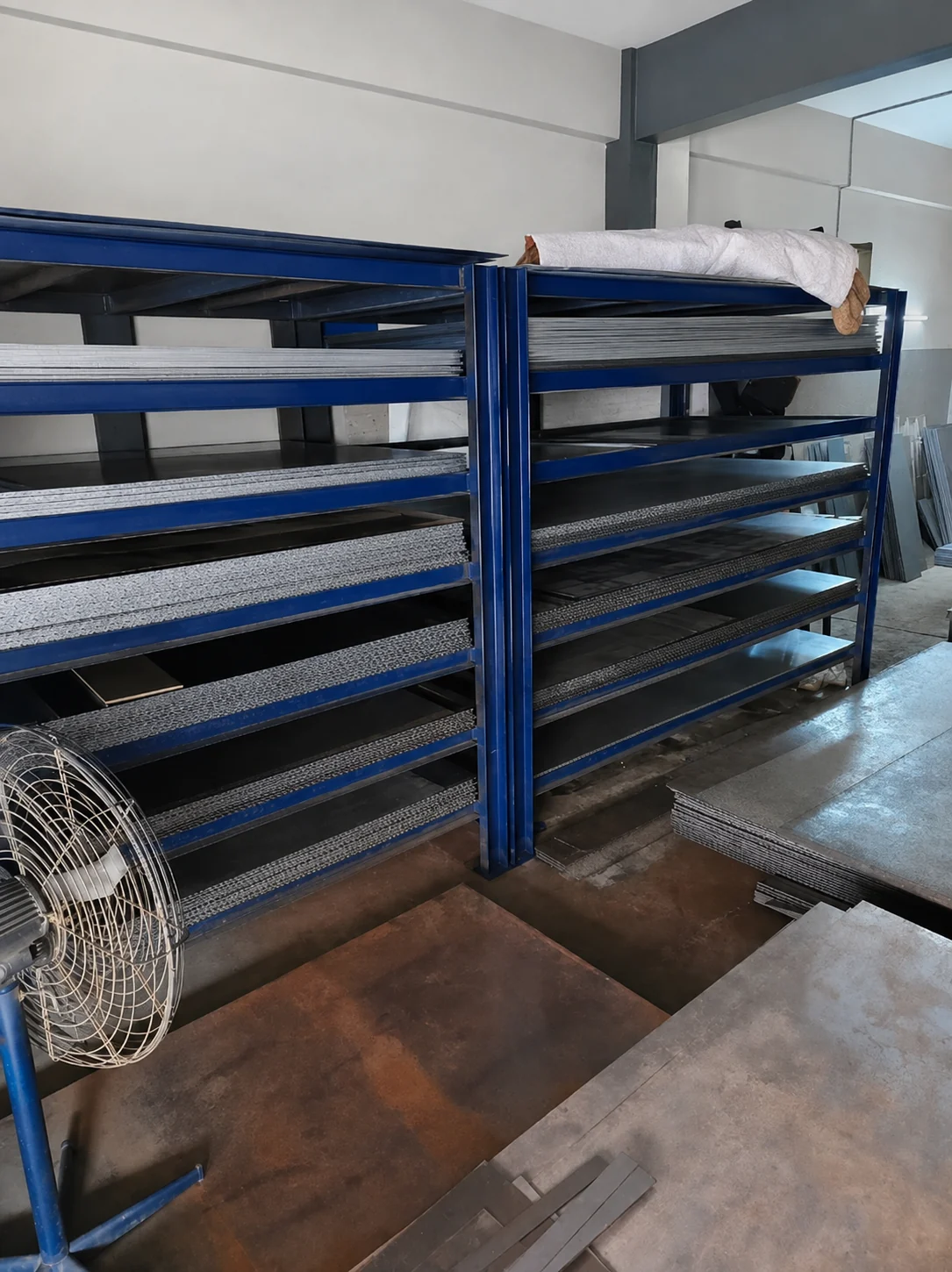 Stocked metal sheets at MM Enterprises